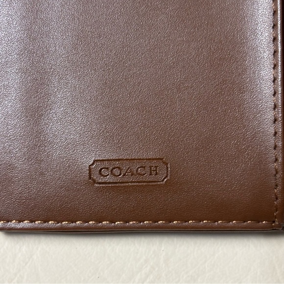 Coach Women's Brown
Signature Checkbook Wallet
Canvas & Leather Tri-Fold - Picture 5 of 6